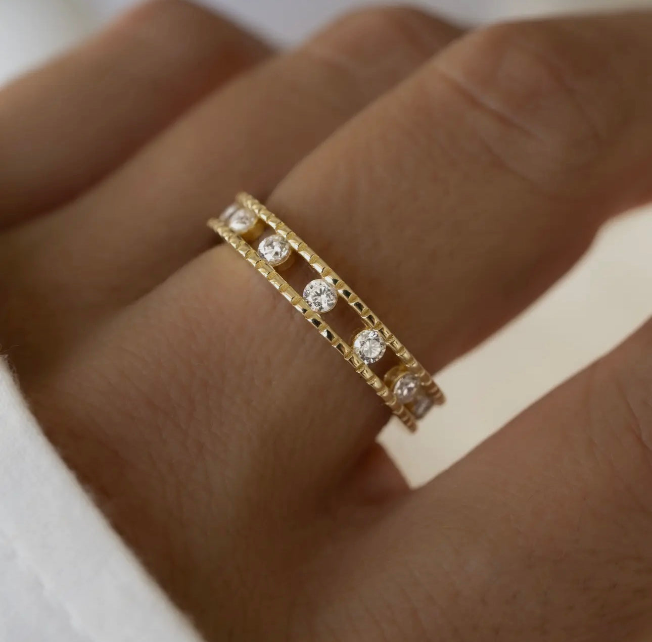 Studded double eternity ring