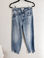 Distressed hem denim